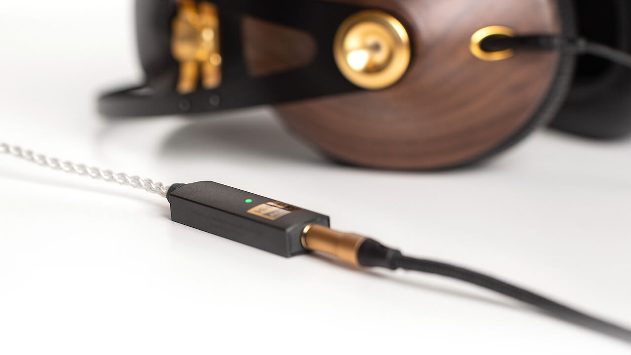 iFi Go Link Dongle DAC connected to Meze 99 Classic headphones walnut